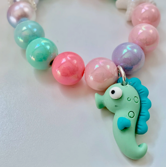 Red Bobble Sea Horse Magic Bracelet